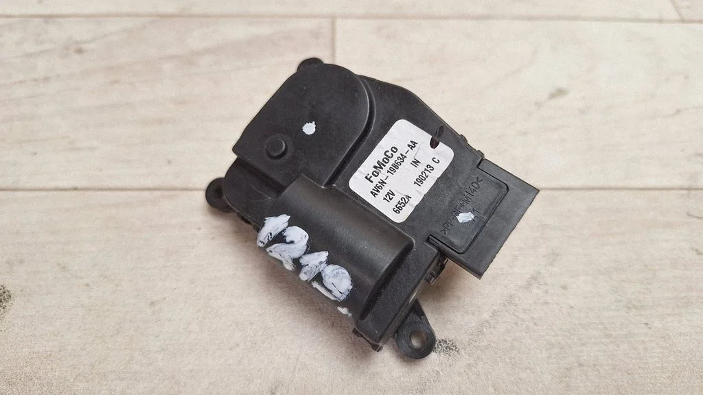 Air flap motor/actuator AV6N19B634AA