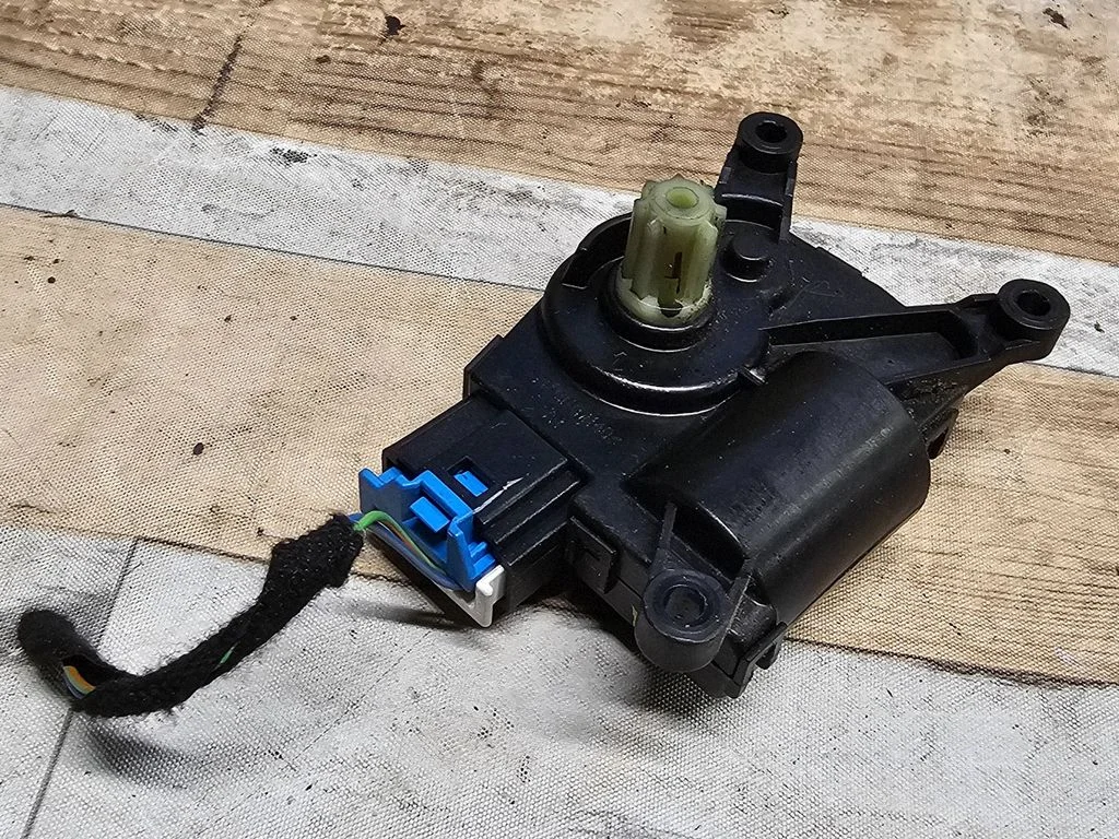 Air flap motor/actuator AV6N19B634AA