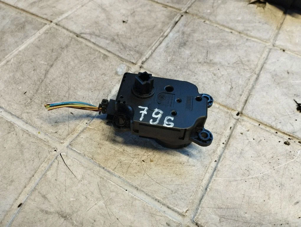 Air flap motor/actuator AV6N19E616AA