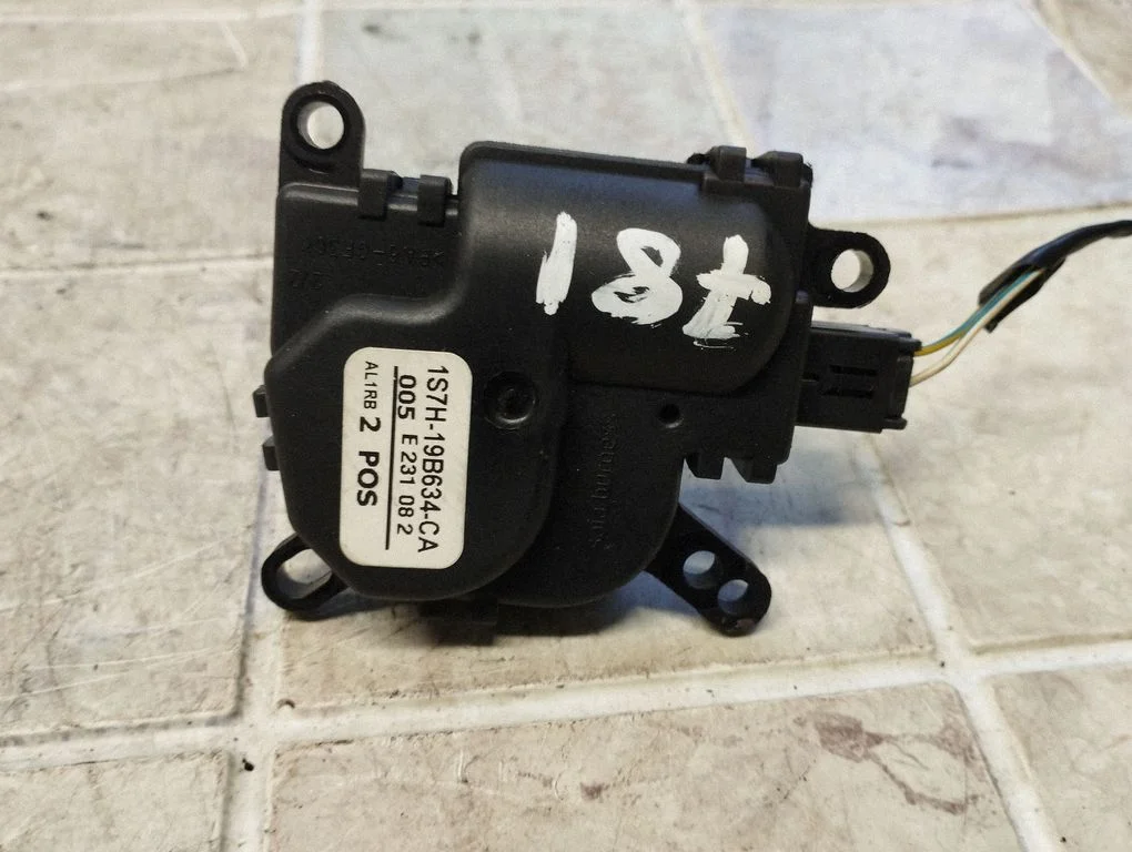Silniczek klapki nawiewu 1S7H19B634CA