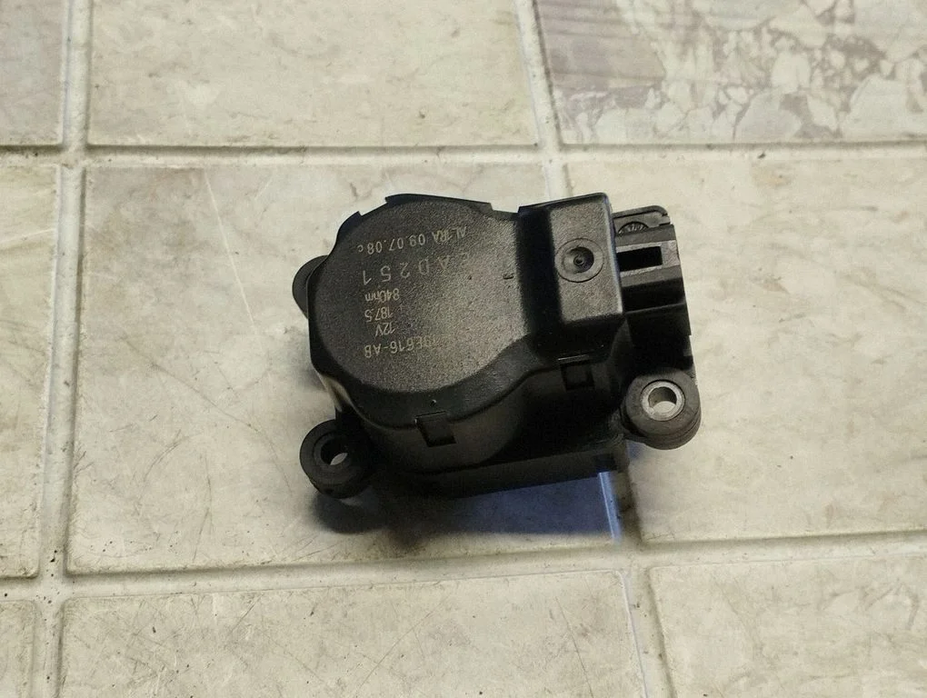 Silniczek klapki nawiewu 3M5H19E616AB