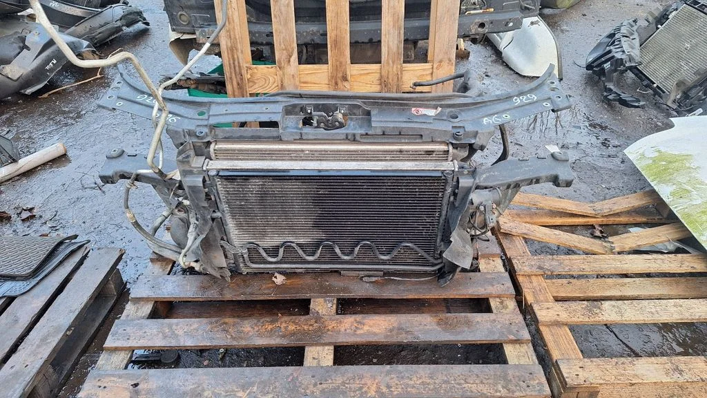 Radiator support slam panel