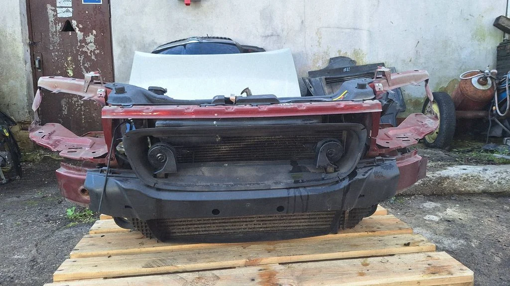 Radiator support slam panel 30760378