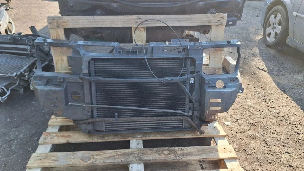 Radiator support slam panel