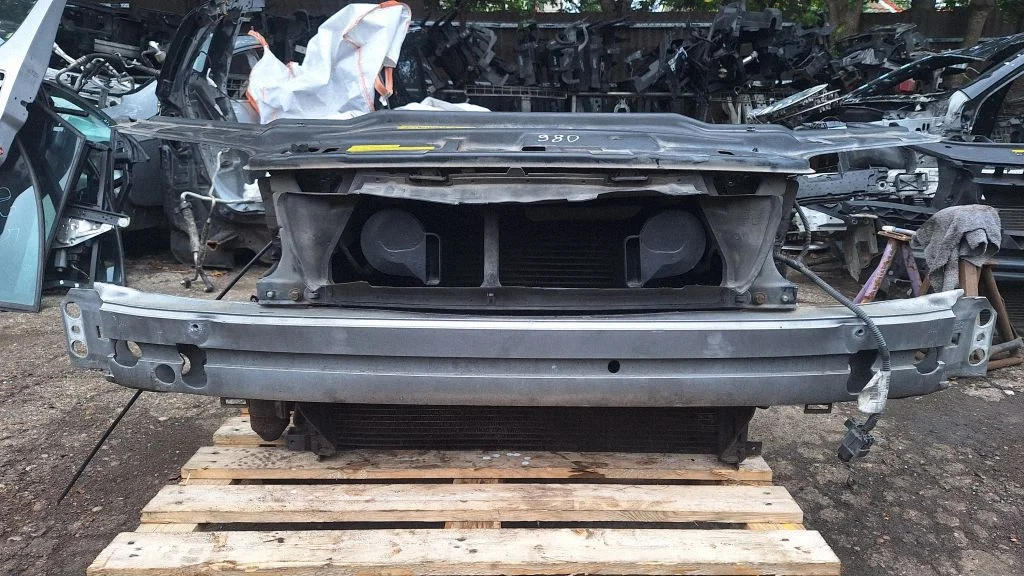 Radiator support slam panel