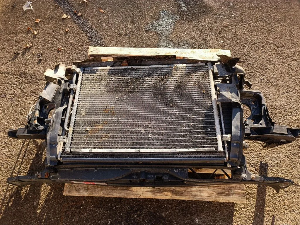Radiator support slam panel