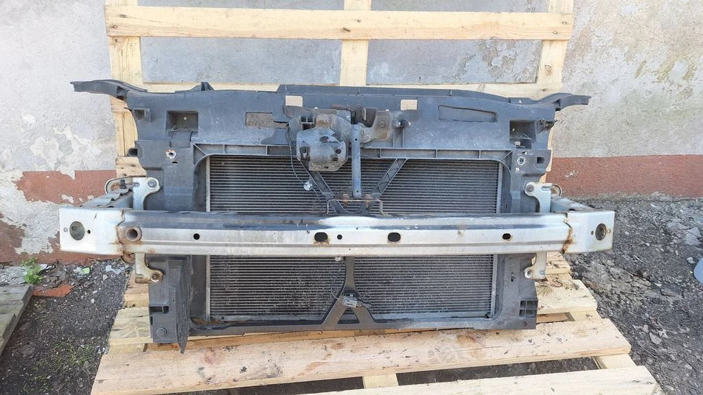 Radiator support slam panel