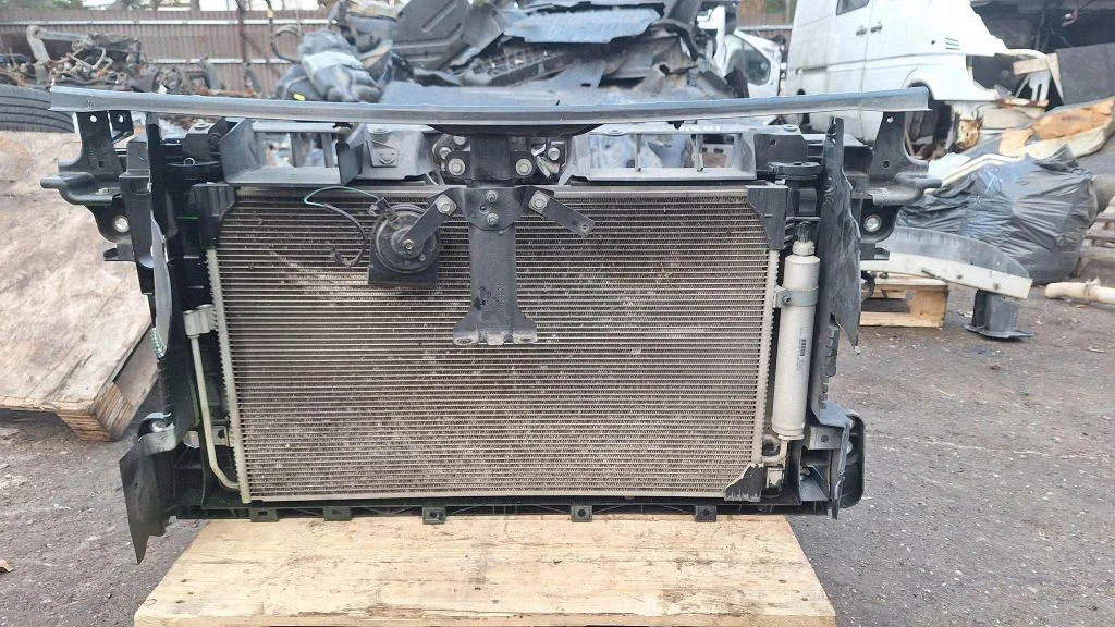 Radiator support slam panel – front