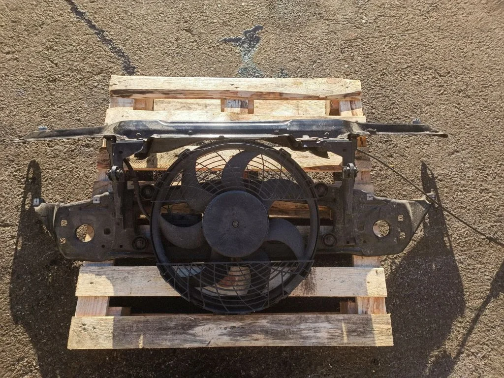 Radiator support slam panel