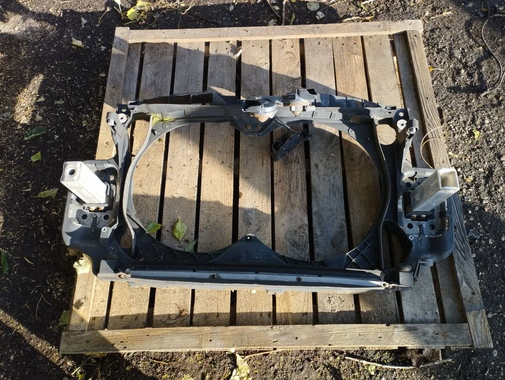 Radiator support slam panel