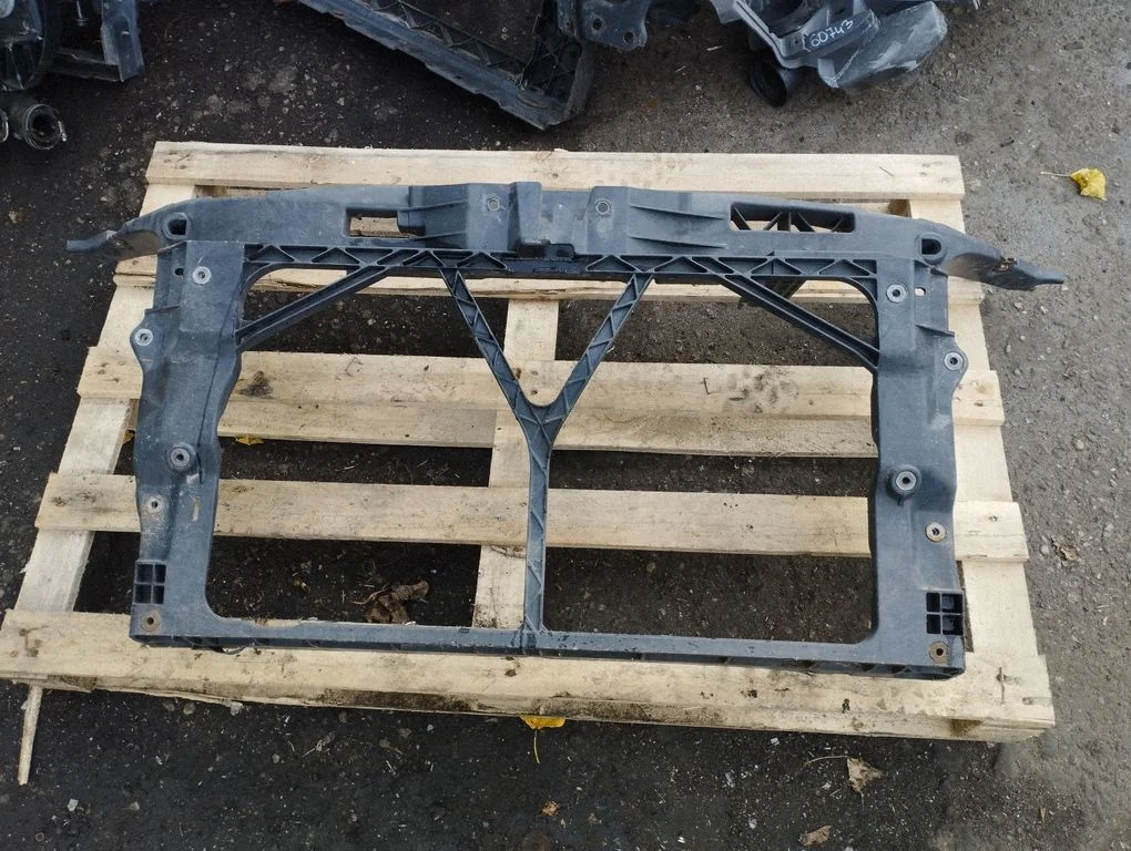 Radiator support slam panel