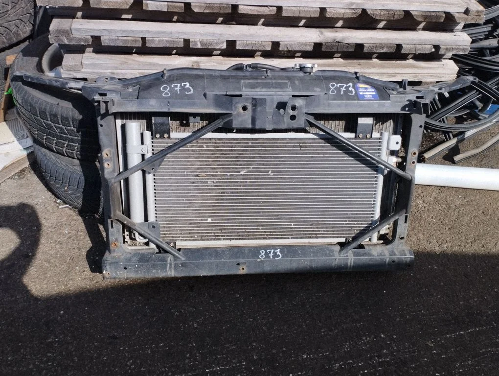 Radiator support slam panel