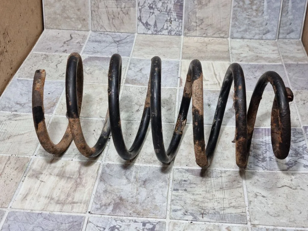 Front coil spring – front right