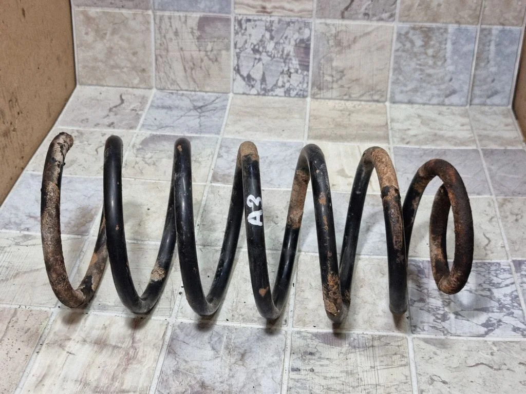 Front coil spring – front left