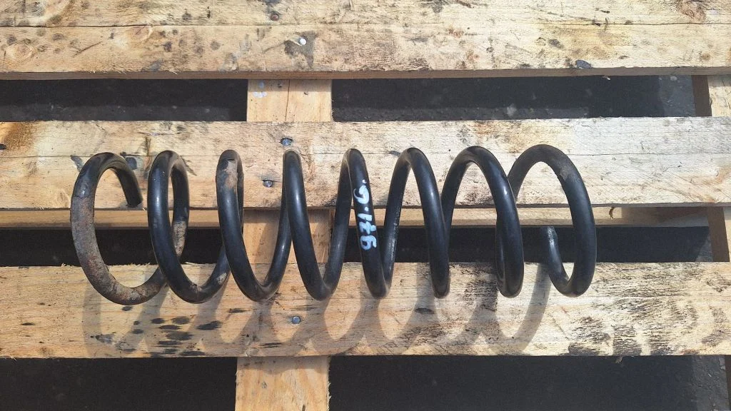 Rear coil spring – rear left