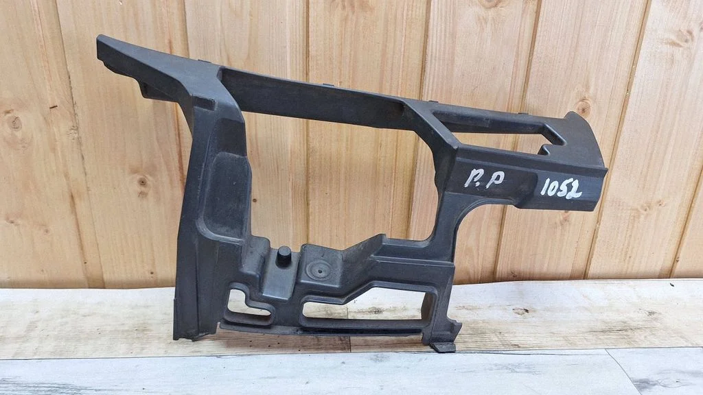 Front bumper mounting bracket 5K0807724B