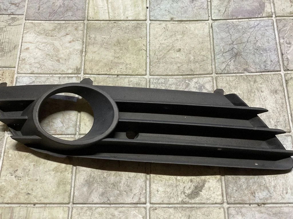 Front fog light trim/grill 13126026