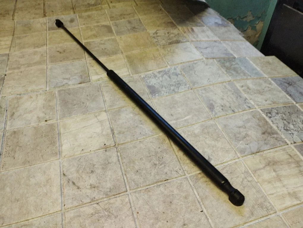 Front bonnet/hood damper/strut 1409100003