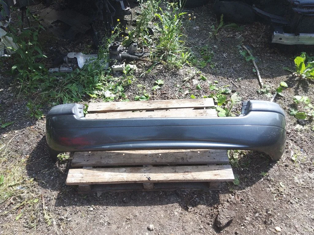 Rear bumper 7700838515