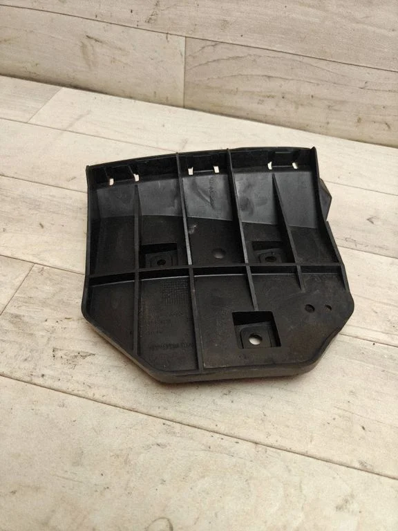 Rear bumper mounting bracket 30763020