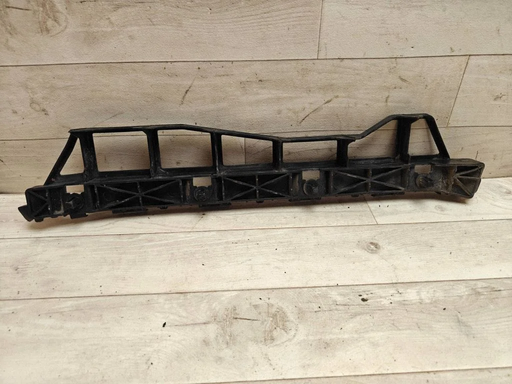 Rear bumper mounting bracket 866163Z000