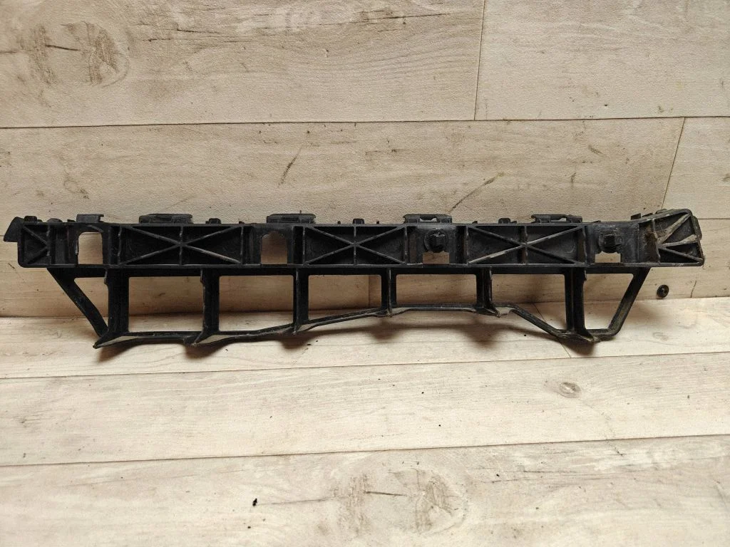 Rear bumper mounting bracket 866153Z000