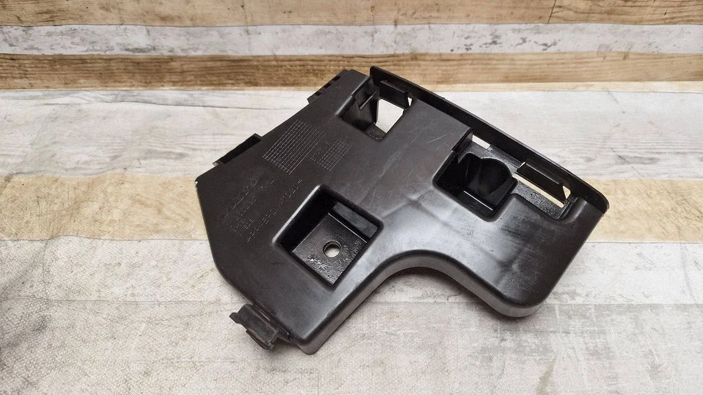 Rear bumper mounting bracket 31265286