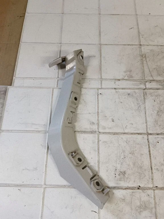 Rear bumper mounting bracket BJ3217A881AC