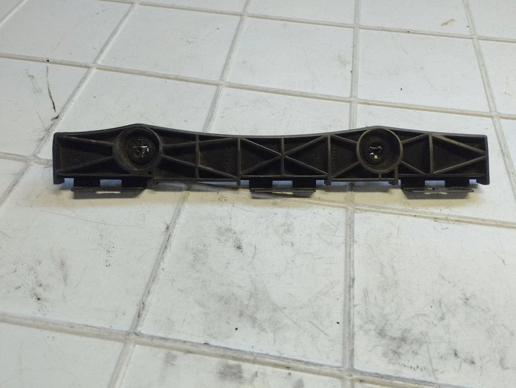 Rear bumper mounting bracket 5215753040