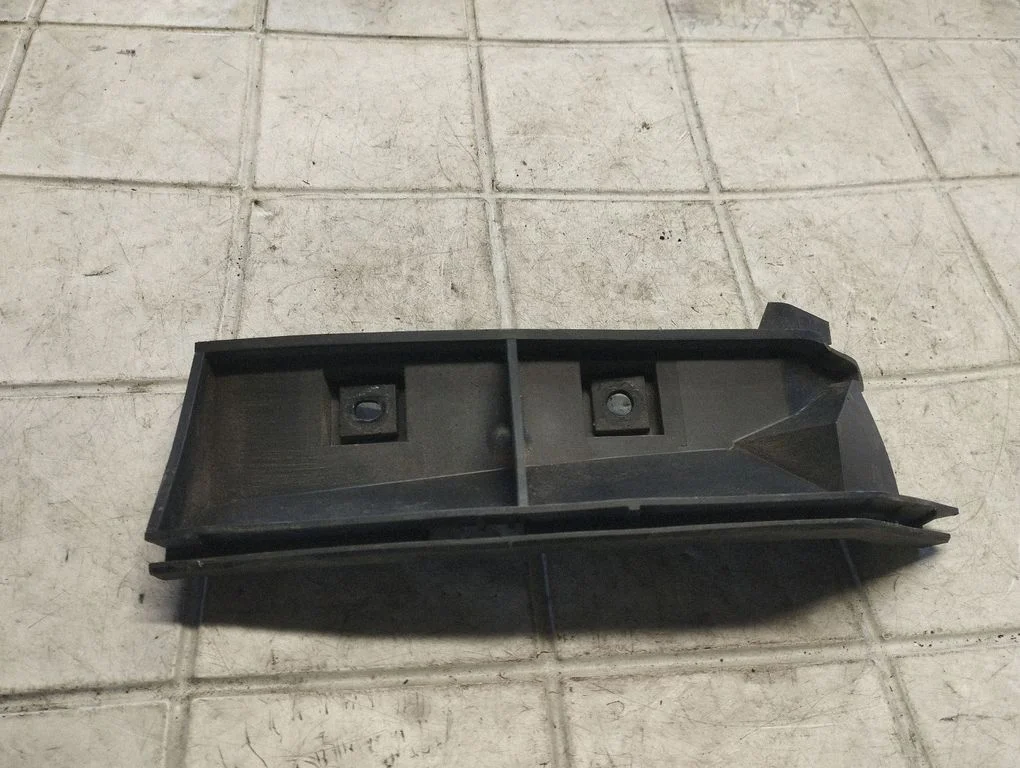 Rear bumper mounting bracket 30764179