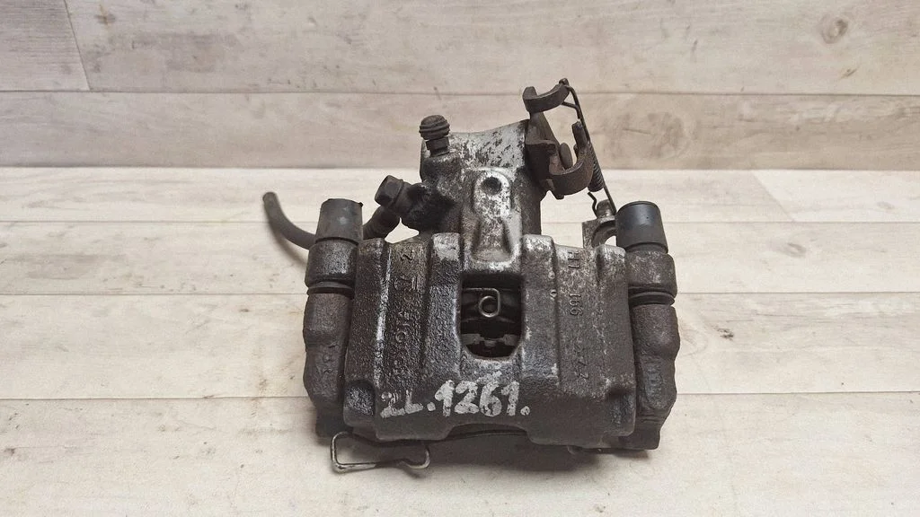 Rear brake caliper – rear left
