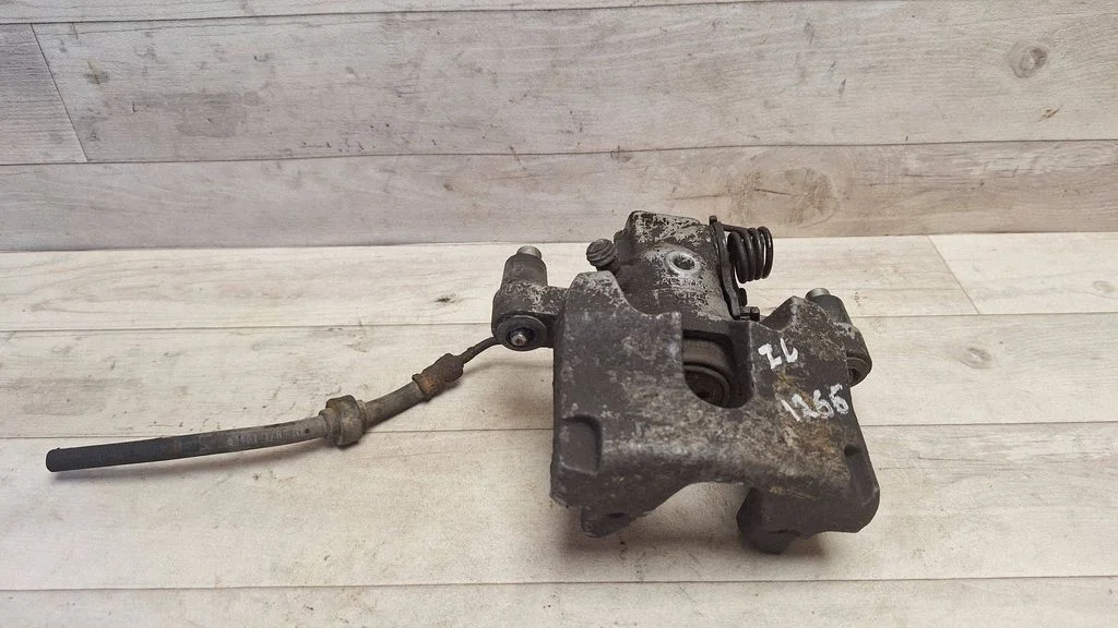 Rear brake caliper – rear left
