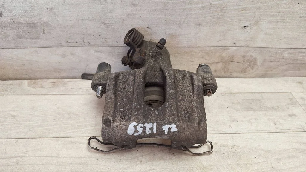 Rear brake caliper – rear left