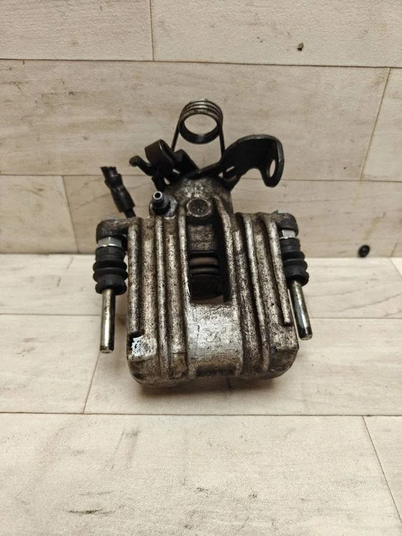 Rear brake caliper – rear left