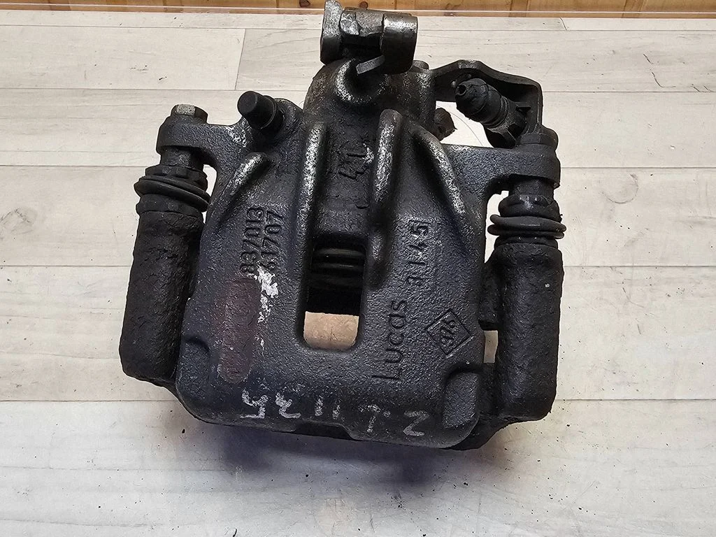 Rear brake caliper – rear left