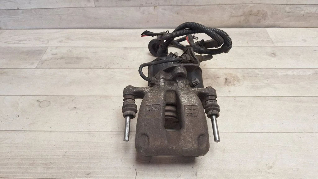 Rear brake caliper – rear left
