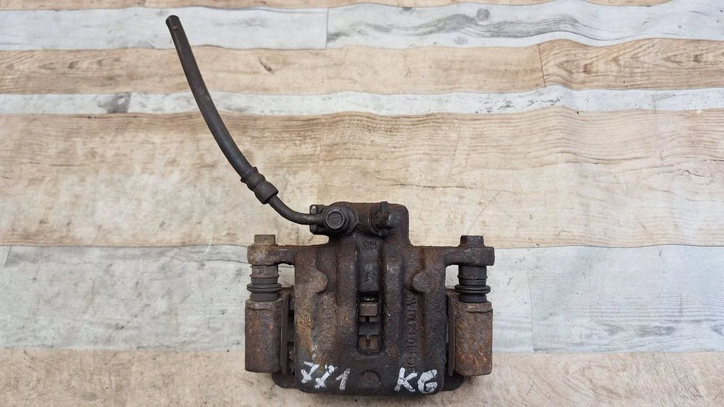 Rear brake caliper – rear left