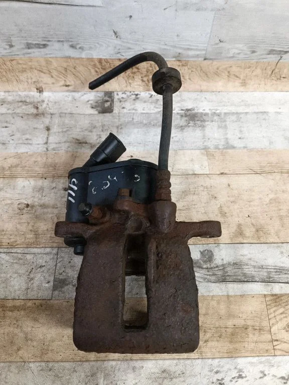 Rear brake caliper – rear left