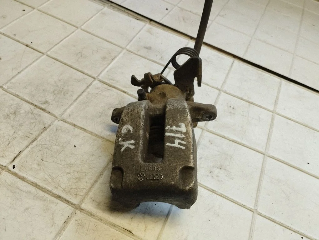 Rear brake caliper – rear left