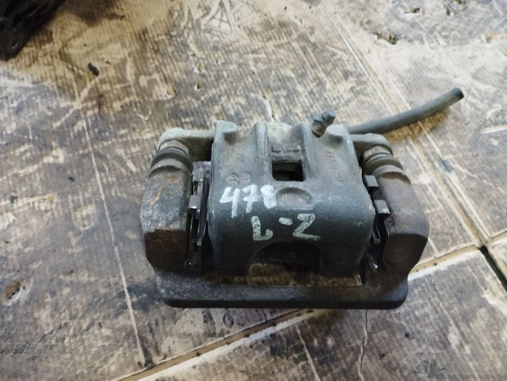Rear brake caliper – rear left