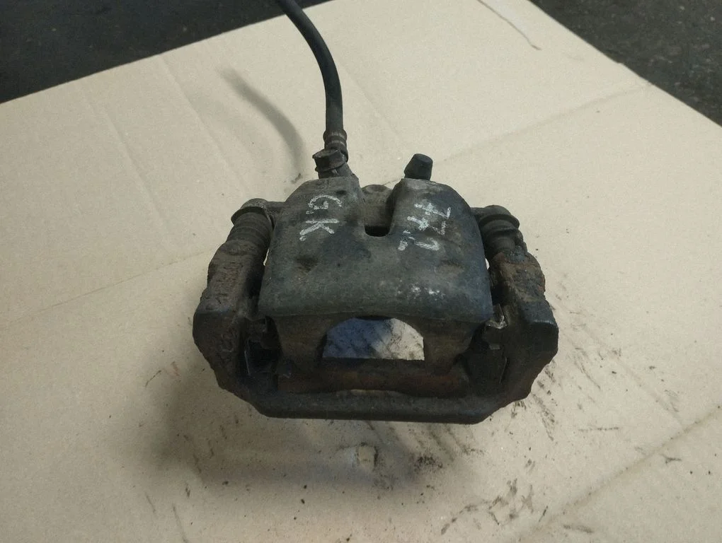 Rear brake caliper – rear left