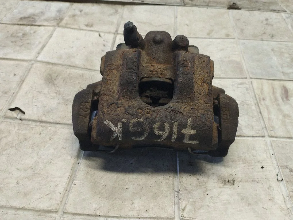 Rear brake caliper – rear left