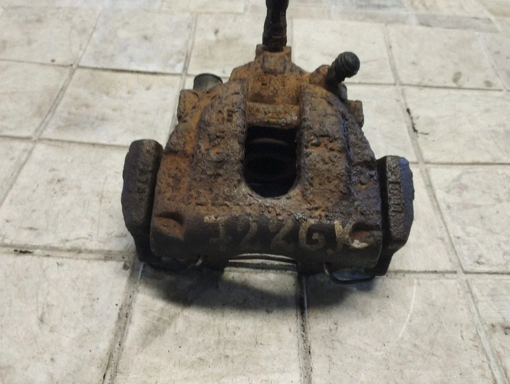 Rear brake caliper – rear left