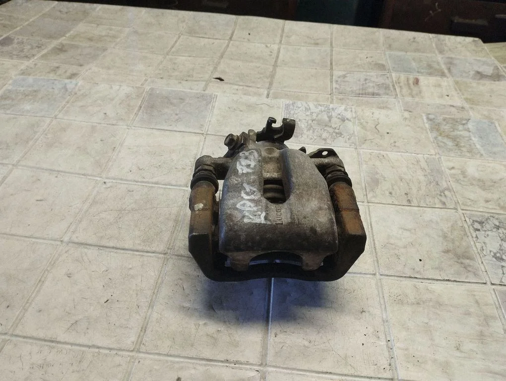 Rear brake caliper – rear left