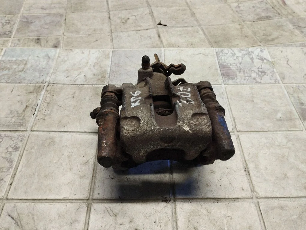 Rear brake caliper – rear left