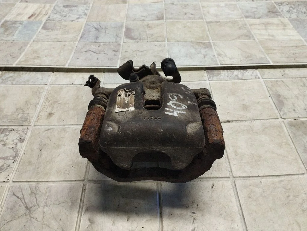 Rear brake caliper – rear left