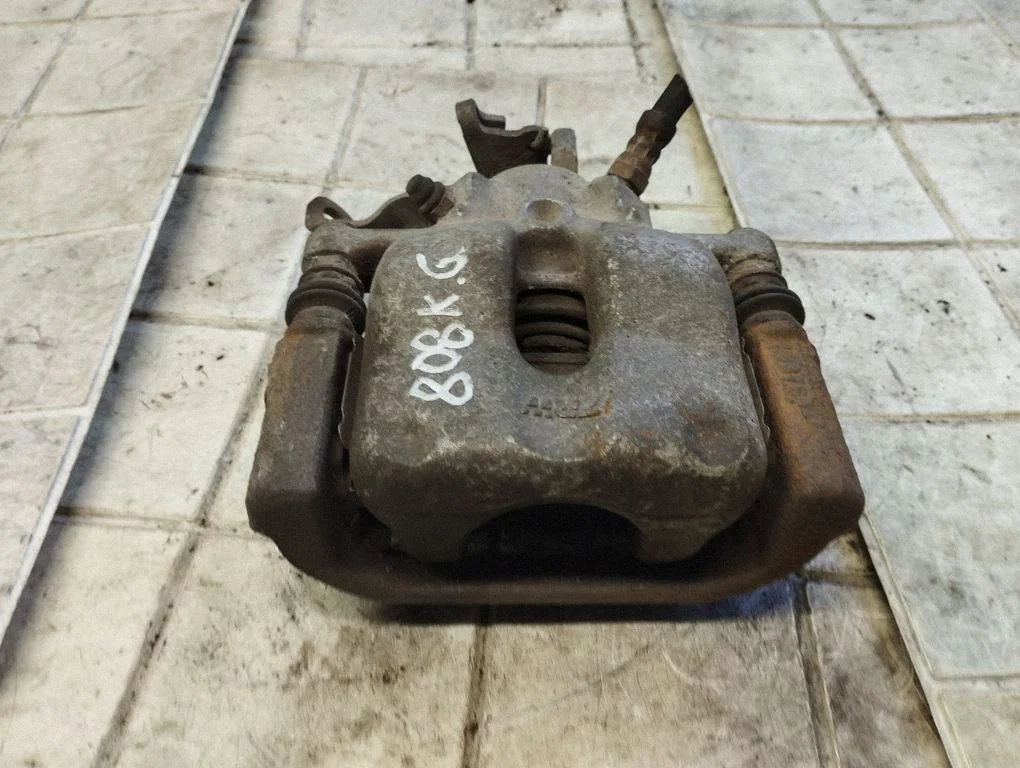 Rear brake caliper – rear left
