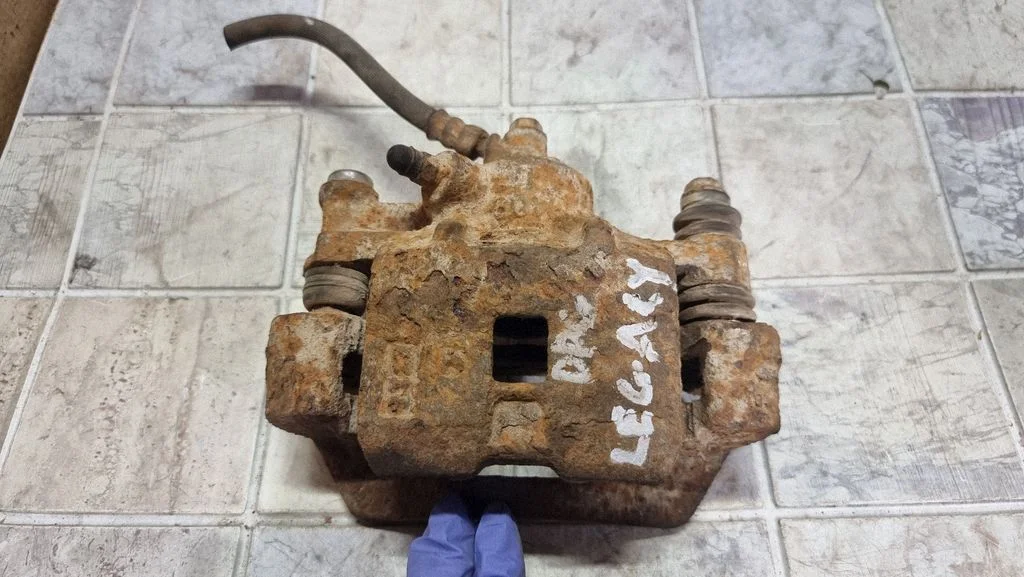 Rear brake caliper 1409