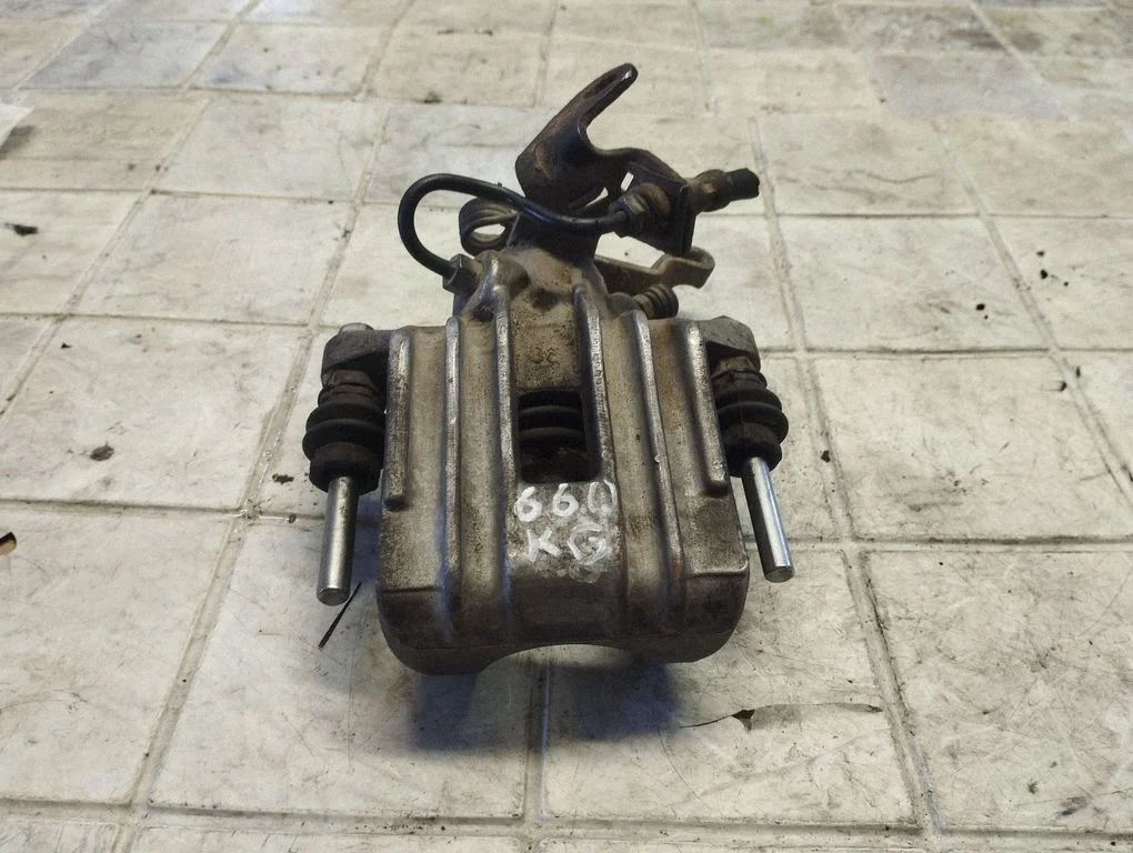 Rear brake caliper – rear left