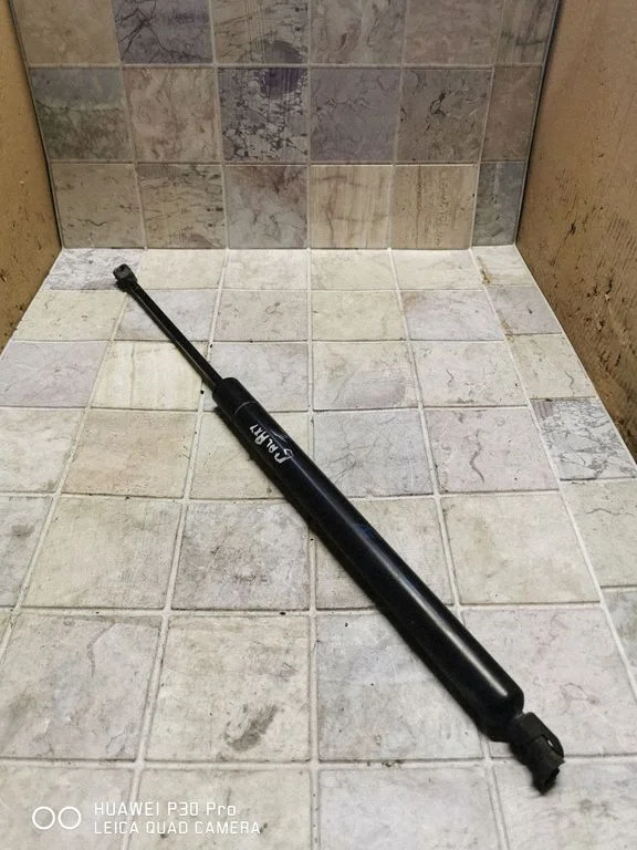 Tailgate/trunk strut/damper 7MO827550